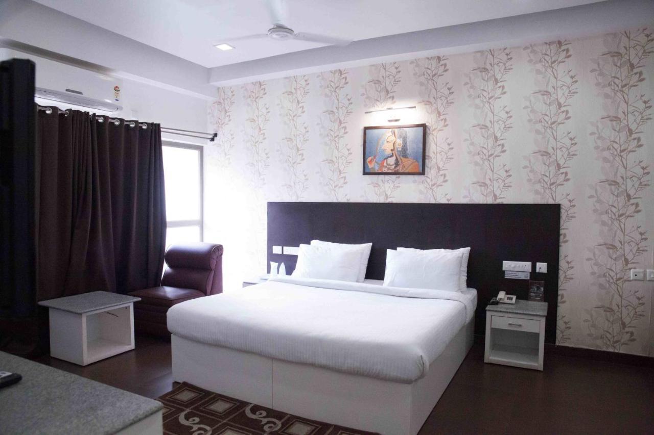 Hotel Central Park Sziliguri Szoba fotó